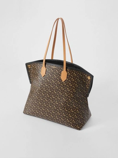 Shop Burberry Large Monogram E-canvas Society Tote In Bridle Brown