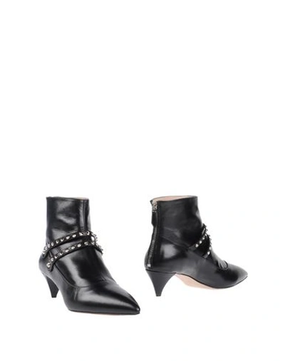 Shop Miu Miu Ankle Boot In Black
