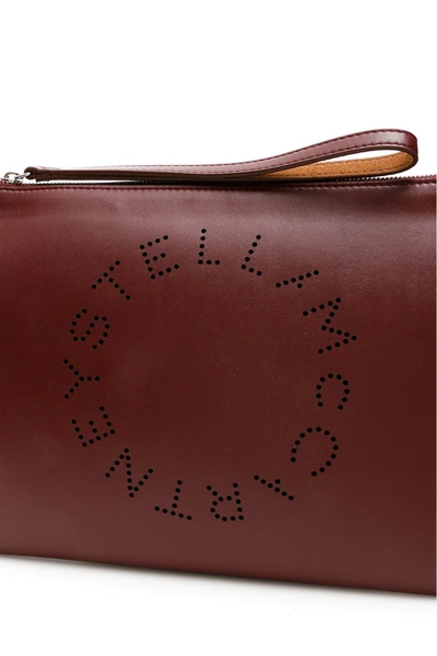 Shop Stella Mccartney Zipped Clutch With Perforated Logo In Wine