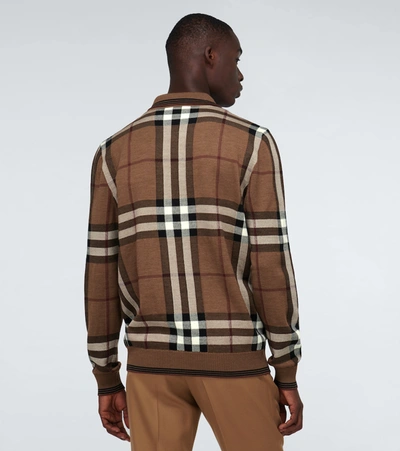 Shop Burberry Checked Long-sleeved Polo Shirt In Brown