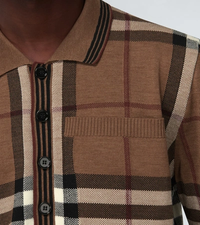 Shop Burberry Checked Long-sleeved Polo Shirt In Brown