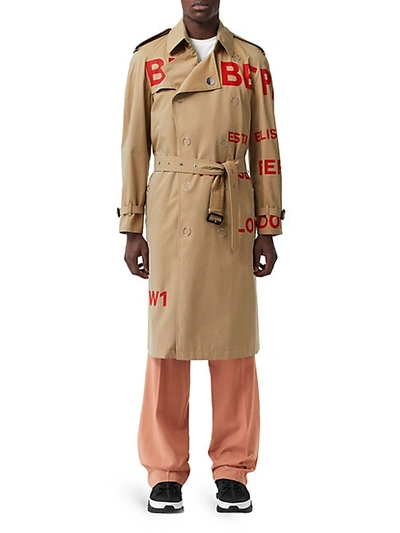 Shop Burberry Logo Double-breasted Snap Trench Coat In Honey