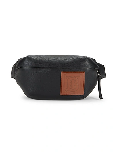 Shop Burberry Sonny Pebbled Leather Belt Bag In Black