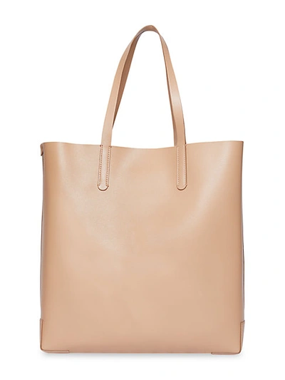Shop Burberry Embossed Logo Tote In Camel