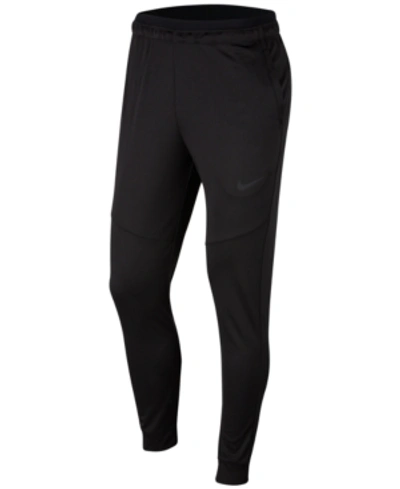 Shop Nike Men's Dry-fit Tapered Pants In Black/white