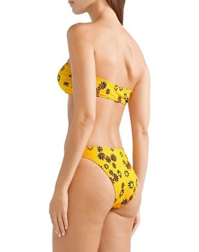 Shop Solid & Striped Bikini Bottoms In Yellow