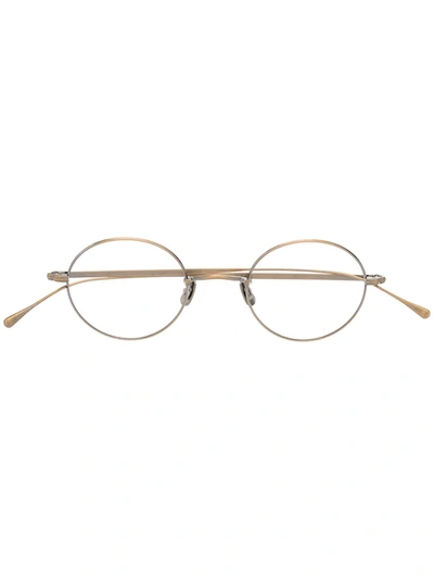 Shop Eyevan7285 Eyevan Round-frame Glasses In Gold
