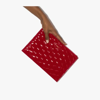 Shop Saint Laurent Red Sade Quilted Leather Clutch Bag