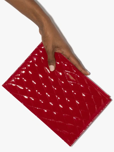 Shop Saint Laurent Red Sade Quilted Leather Clutch Bag