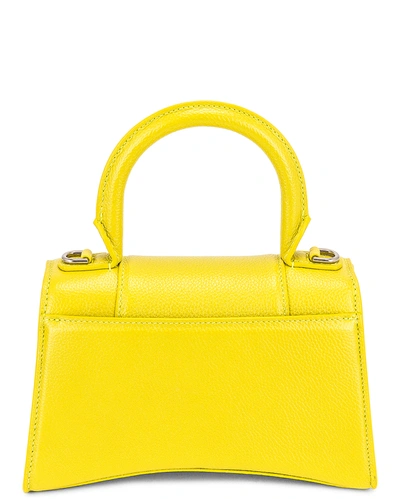 Shop Balenciaga Xs Hourglass Top Handle Bag In Lime