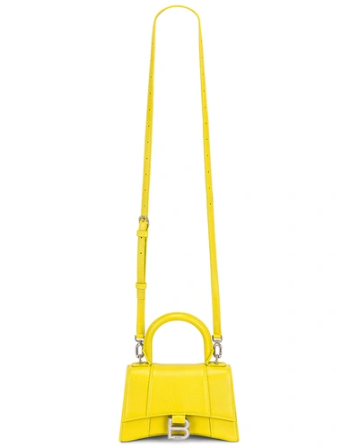 Shop Balenciaga Xs Hourglass Top Handle Bag In Lime