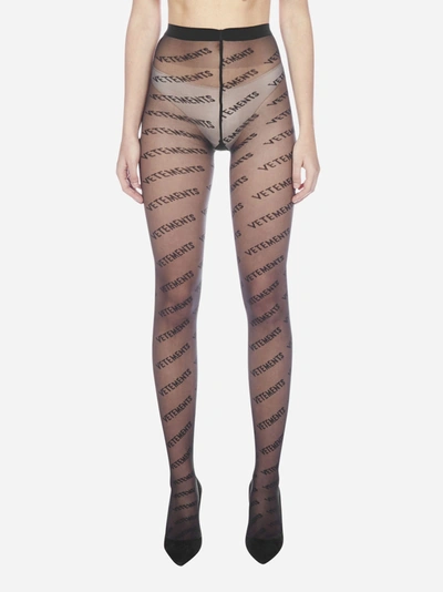 Shop Vetements All-over Logo Tights