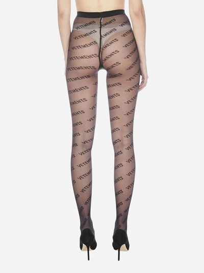 Shop Vetements All-over Logo Tights