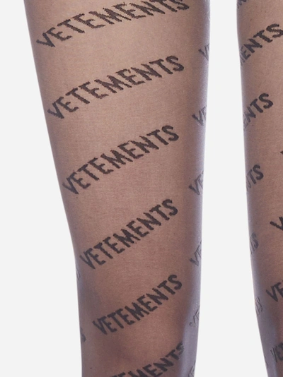 Shop Vetements All-over Logo Tights
