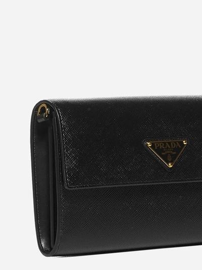Shop Prada Logo-plaque Saffiano Leather Clutch Bag
