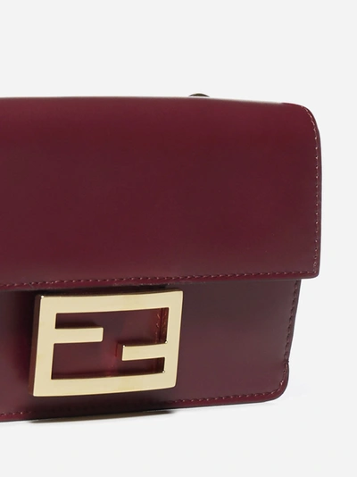 Shop Fendi Flat Baguette Leather Bag