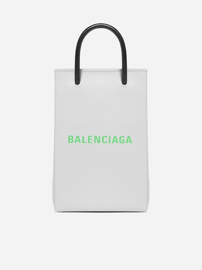 Shop Balenciaga Shopping Phone Holder In Pelle Con Logo