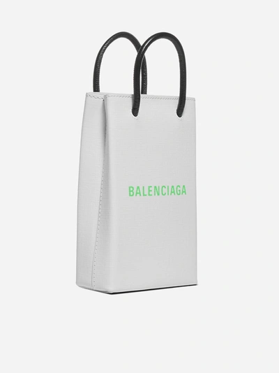 Shop Balenciaga Shopping Phone Holder In Pelle Con Logo