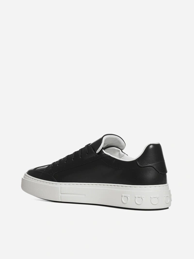 Shop Ferragamo Gancini Leather Sneakers In Black