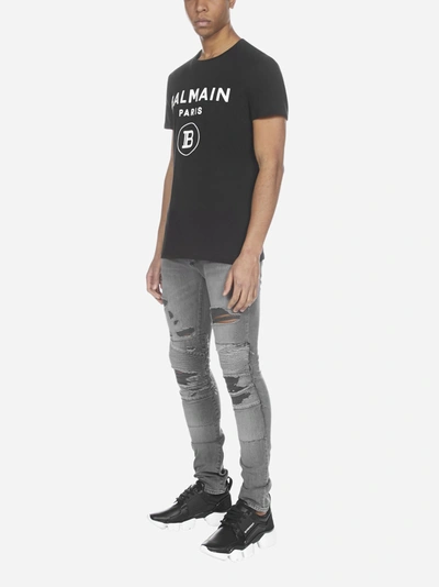 Shop Balmain Distressed Slim-fit Jeans