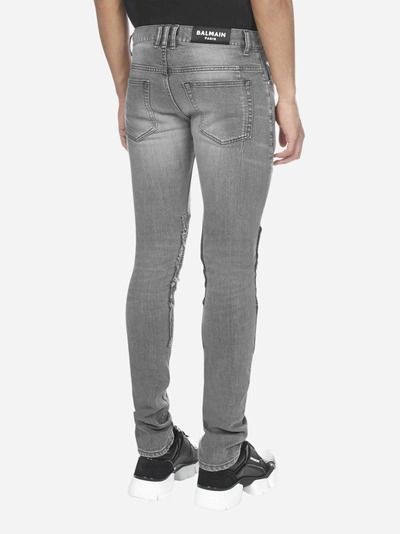 Shop Balmain Distressed Slim-fit Jeans