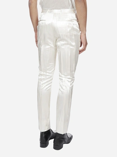 Shop Saint Laurent Pleated Silk Satin Trousers