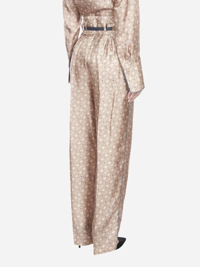 Shop Fendi Karligraphy Motif And Striped Print Silk Trousers