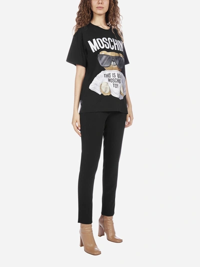 Shop Moschino T-shirt Oversize In Cotone Con Stampa E Logo