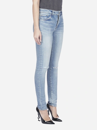 Shop Saint Laurent Jeans Slim In Denim Stretch Con Tagli