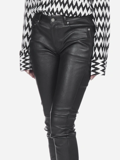 Shop Saint Laurent Leather Trousers