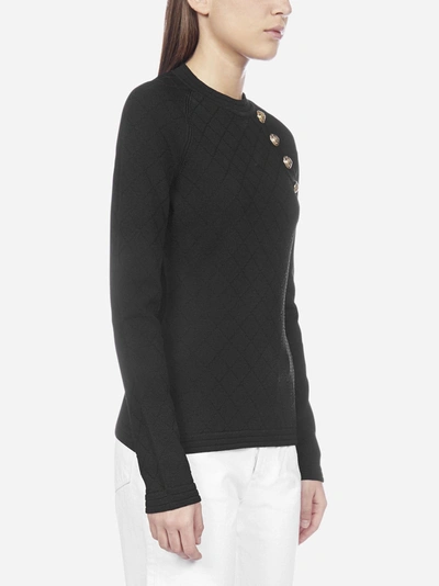 Shop Balmain Buttoned Stretch Knit Sweater In Black