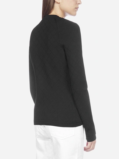 Shop Balmain Buttoned Stretch Knit Sweater In Black