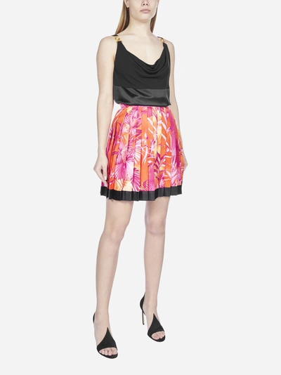 Shop Versace Jungle Print Pleated Miniskirt