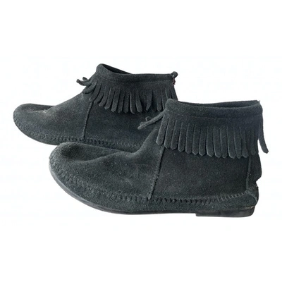Pre-owned Minnetonka Boots In Black