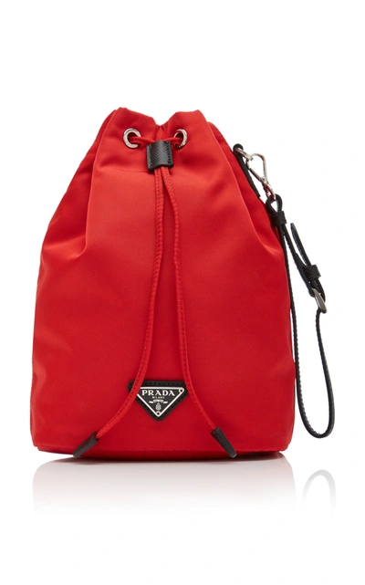 Shop Prada Vela Leather-trimmed Canvas Drawstring Backpack In Red