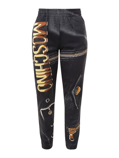 Shop Moschino Print Trousers In Black