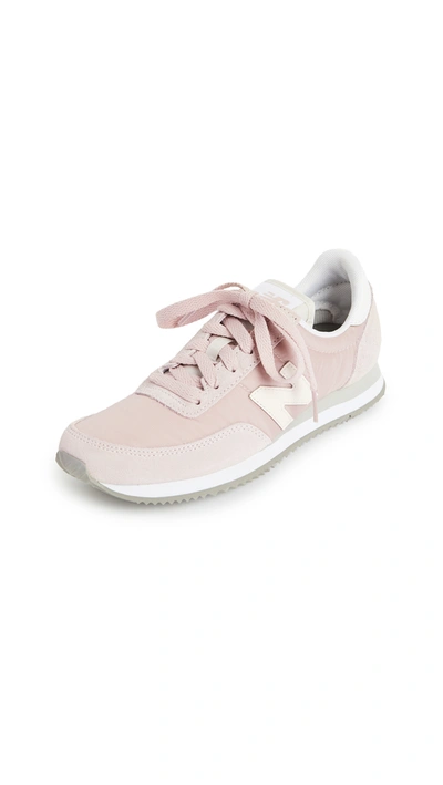 Shop New Balance 720 Lifestyle Sneakers In Space Pink/white