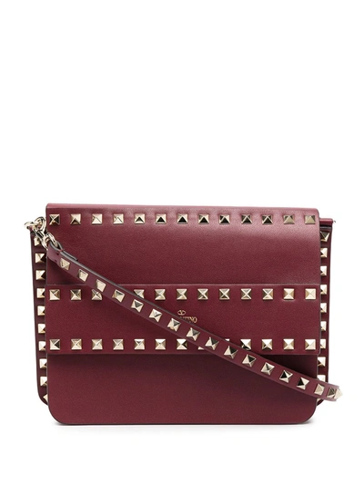 Shop Valentino Rockstud Cross Body Bag In Red