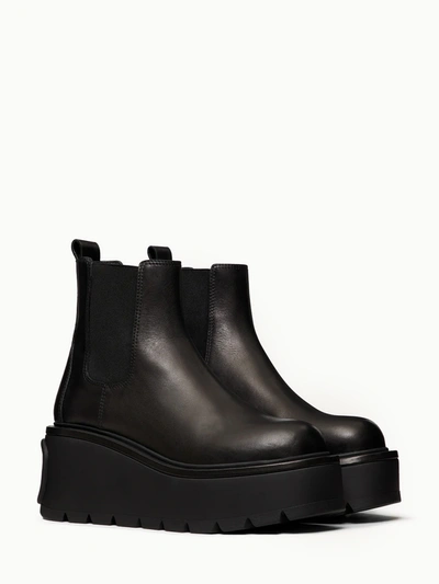 Shop Valentino Uniqueform Flatform Ankle Boot In Black