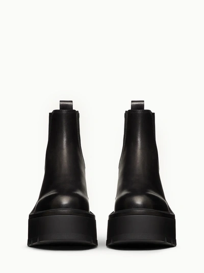 Shop Valentino Uniqueform Flatform Ankle Boot In Black
