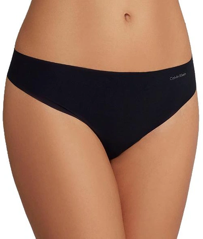 Shop Calvin Klein Invisibles Thong 3-pack In Black,bare,aim