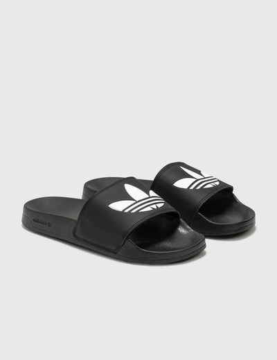 Shop Adidas Originals Adilette Lite Slides In Core Black / Cloud White / Core Black