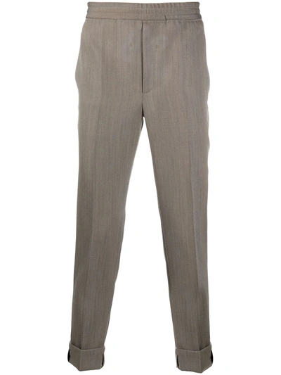 Shop Neil Barrett Tapered Trousers In Neutrals