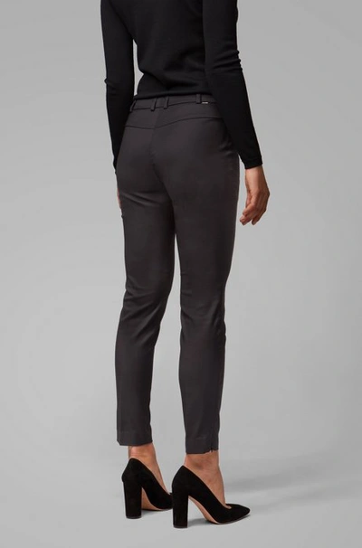 Shop Hugo Boss Cropped Slim-fit Trousers With Zipped Hems In Black
