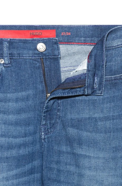 Shop Hugo Boss - Charlie Super Skinny Fit Jeans With Ring Stud Side Seams - Dark Blue