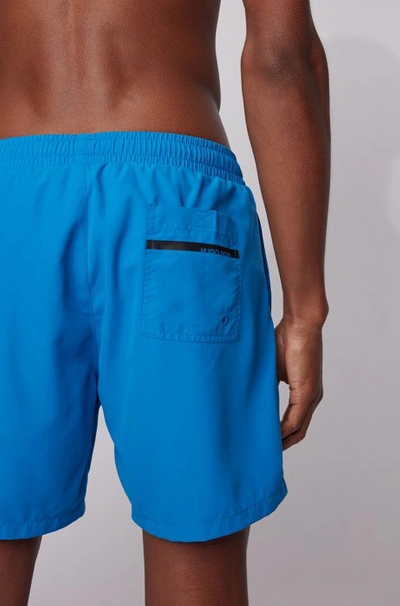 Shop Hugo Boss - Medium Length Swim Shorts With Heat Sealed Logo Print - Blue