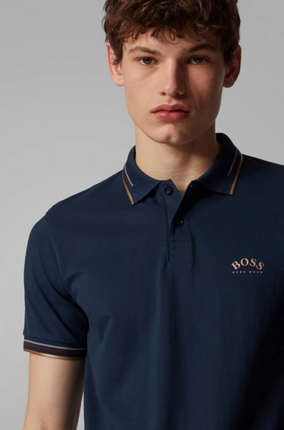 Shop Hugo Boss - Slim Fit Polo Shirt In Stretch Piqué With Curved Logo - Dark Blue
