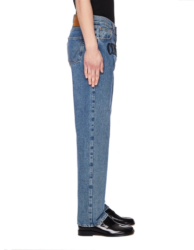 Shop Vetements Embroidered Censored Jeans In Blue