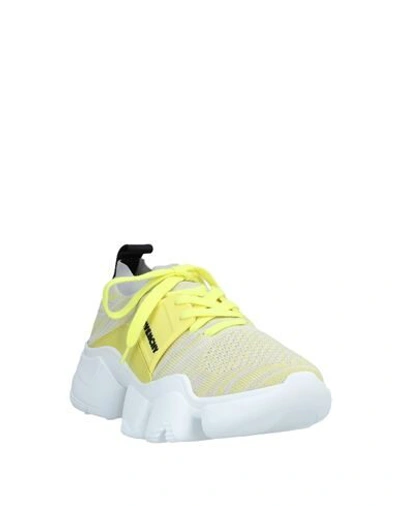 Shop Givenchy Sneakers In Yellow