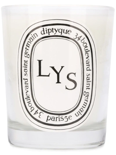 Shop Diptyque Lys Candle In White